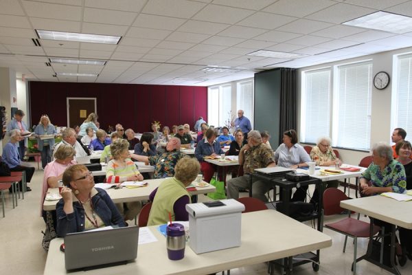 people discussing at vmga meeting